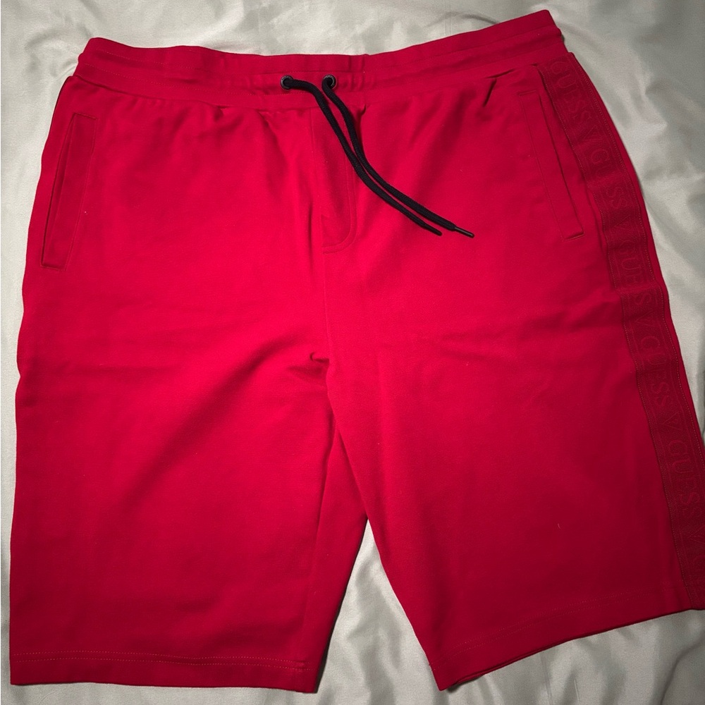 Men’s Guess Red Shorts with logo on the side